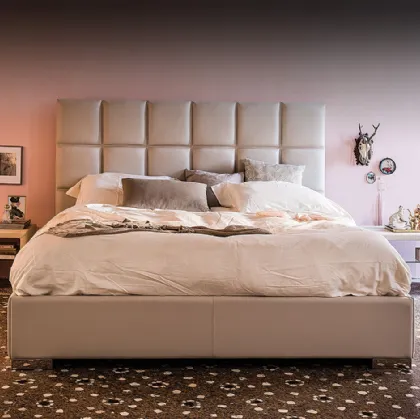 Letto contenitore con testiera in ecopelle trapuntata William di Cattelan Italia